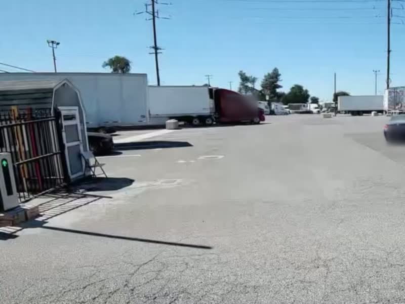 Sunny California truck yard seen from a Sigma gate camera